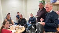 Mor Lab members celebrate together during lab event.